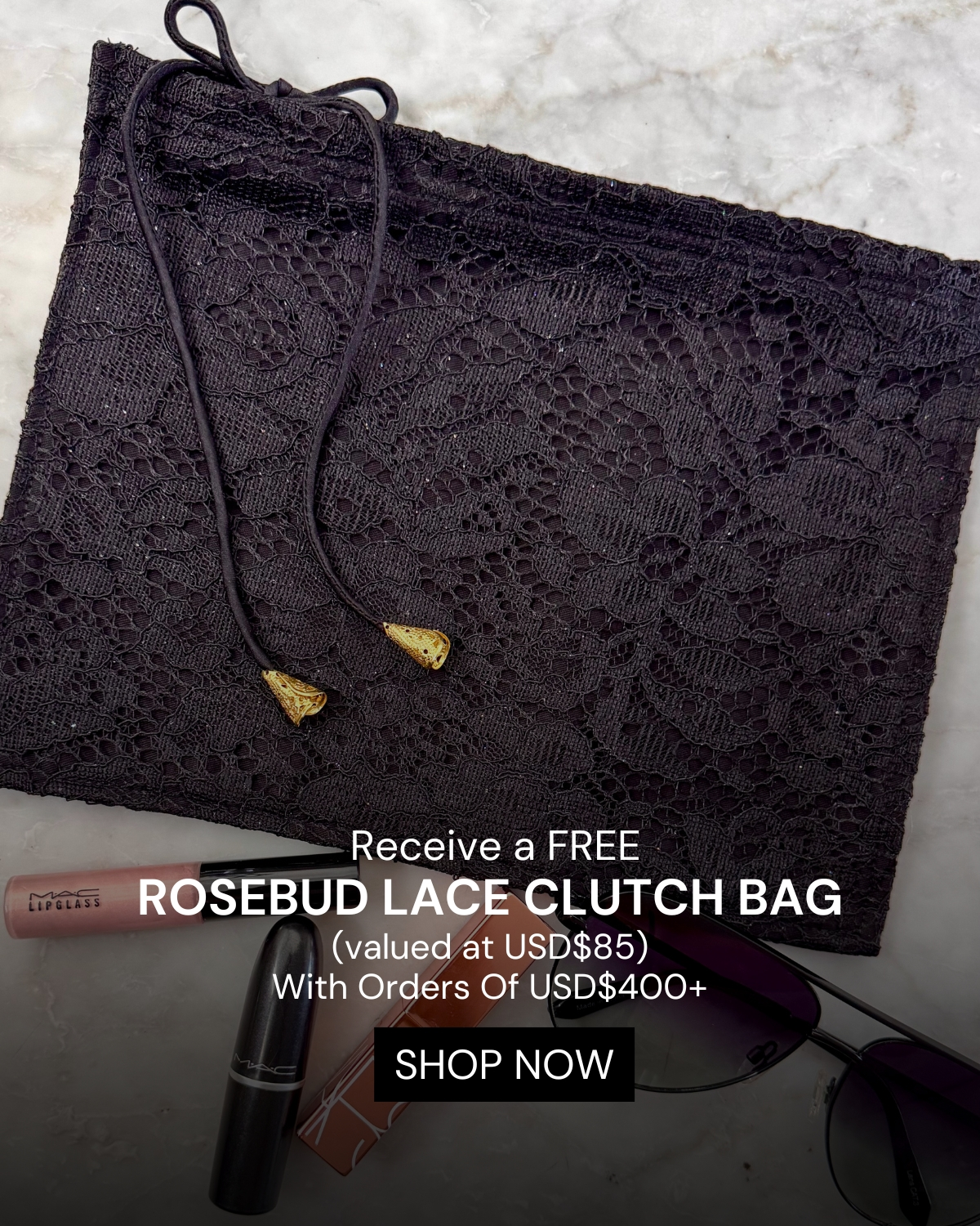 The Rosebud Lace Clutch in Black — complimentary with orders of USD$400+