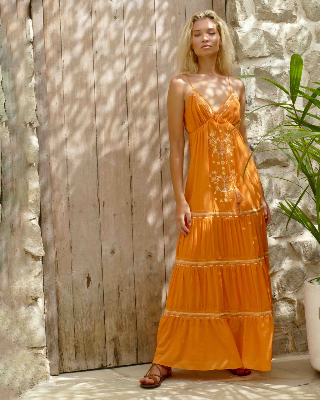 Model is 176cm / 5' 9" inches and wears a size XS