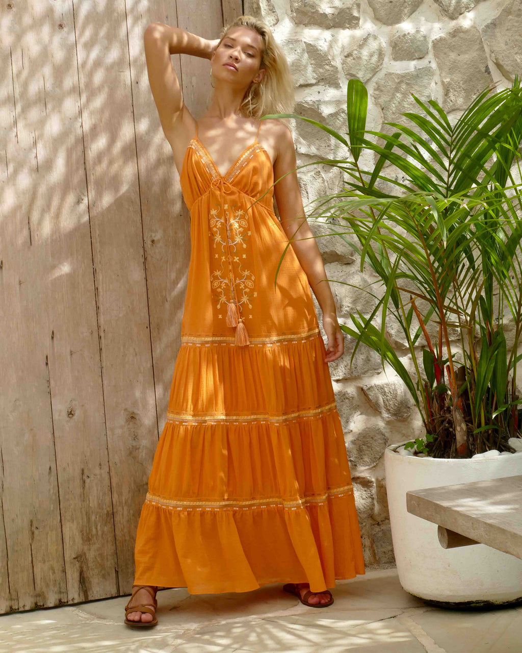 Model is 176cm / 5' 9" inches and wears a size XS