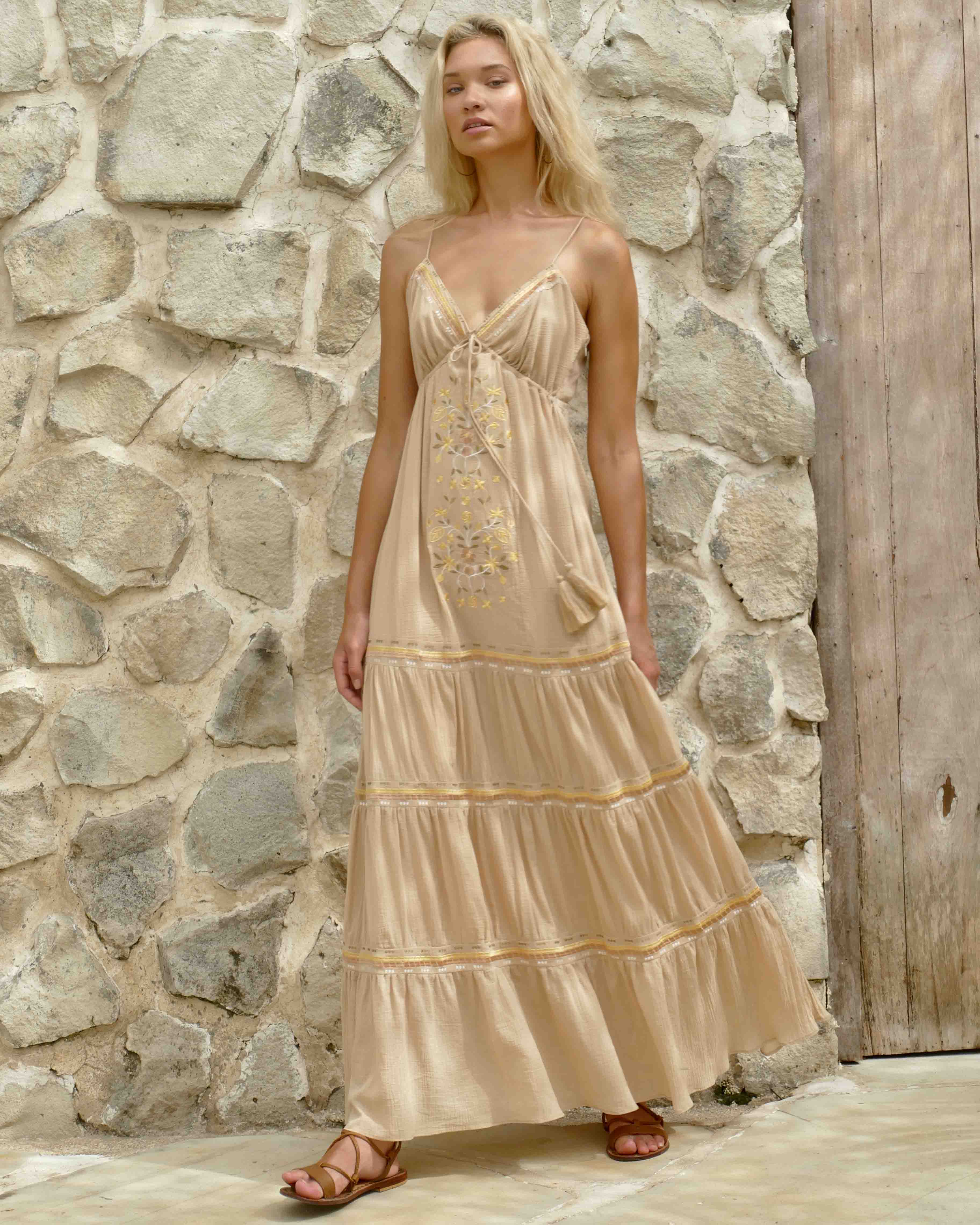 Model is 176cm / 5' 9" inches and wears a size XS